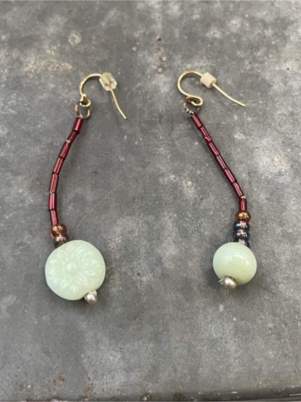 Artisan green and red beaded Drop Earrings with flower etching